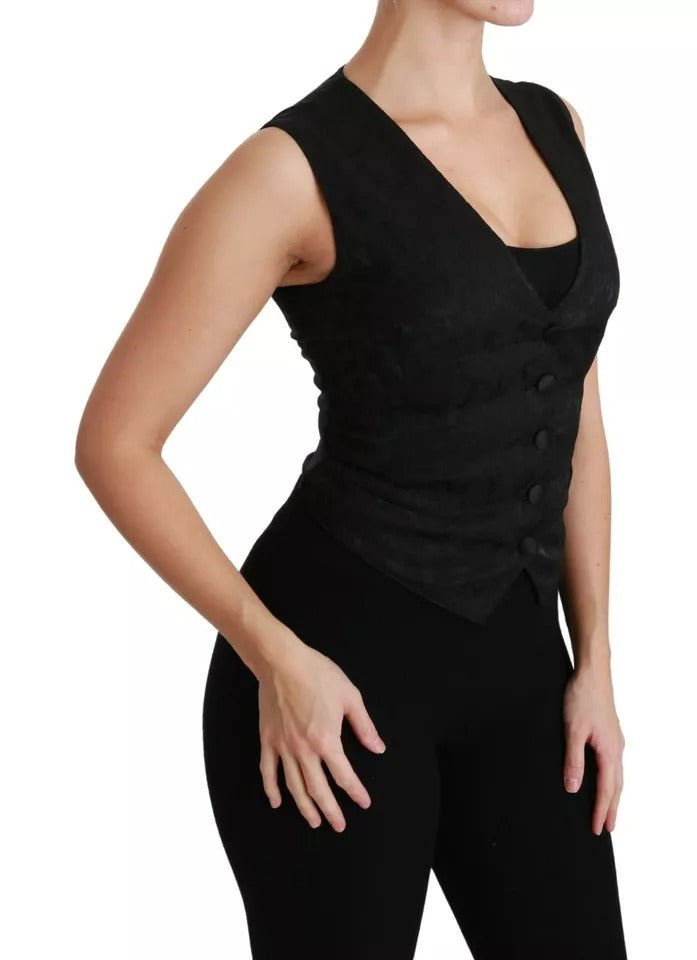 Elevate your wardrobe with the Dolce & Gabbana Black Lace Waistcoat Slim Vest, a masterpiece of silk and lace that embodies timeless elegance and sophisticated allure.