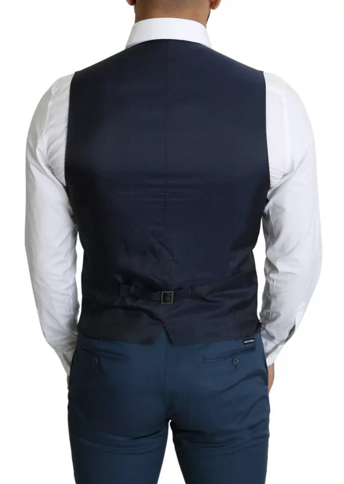 Elevate your elegance with the Dolce & Gabbana Navy Blue Waistcoat, a luxurious cotton masterpiece from the MainLine collection, embodying timeless Italian artistry for discerning occasions.