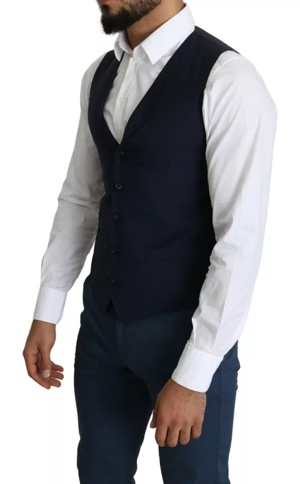 Elevate your elegance with the Dolce & Gabbana Navy Blue Waistcoat, a masterpiece of refined cotton craftsmanship, exuding timeless luxury for every distinguished occasion.