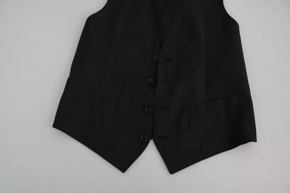 Elevate your formal wardrobe with the Dolce & Gabbana Black Men Formal STAFF Dress Waistcoat Vest, a masterpiece of Italian craftsmanship in luxurious virgin wool and polyester blend.
