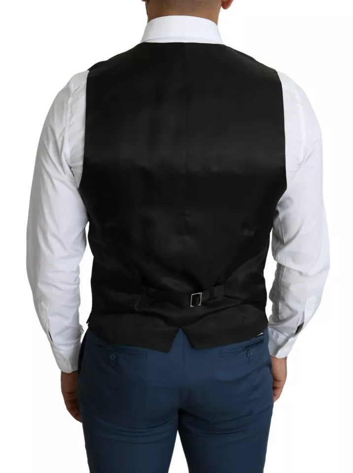 Elevate your formal wardrobe with the Dolce & Gabbana Black Men Formal STAFF Dress Waistcoat Vest, a masterpiece of Italian craftsmanship blending luxury materials for timeless sophistication.