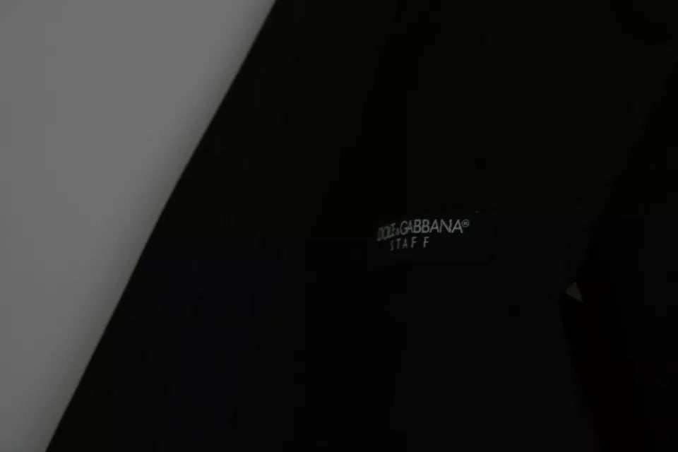 Elevate your formal wardrobe with the Dolce & Gabbana Black Men Formal STAFF Dress Waistcoat Vest, crafted from luxurious virgin wool for timeless sophistication and exquisite Italian craftsmanship.