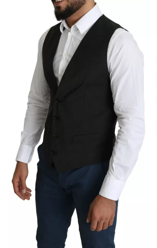 Elevate your formal wardrobe with the Dolce & Gabbana Black Men Formal STAFF Dress Waistcoat Vest, a masterpiece of Italian craftsmanship blending luxury materials for timeless elegance.