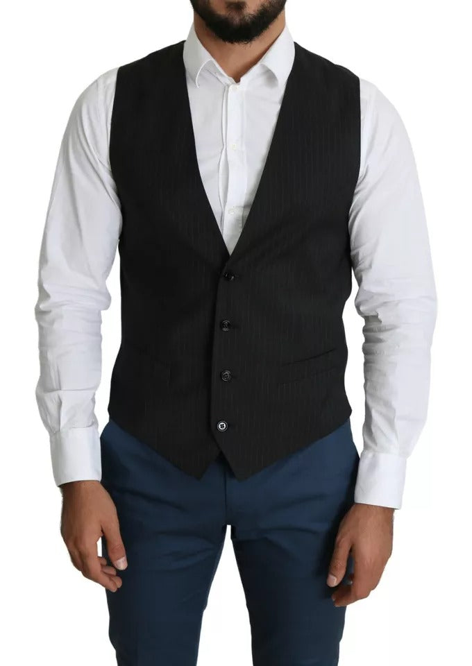 Elevate your formal wardrobe with the Dolce & Gabbana Black Men Formal STAFF Dress Waistcoat Vest, a masterpiece of Italian craftsmanship, blending luxurious virgin wool and sophisticated design for timeless elegance.