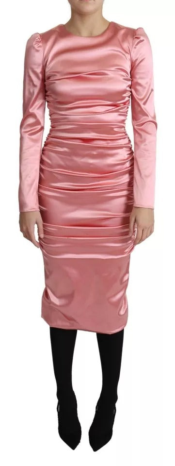 Indulge in the exquisite Dolce & Gabbana Pink Long Sleeves Bodycon Sheath Midi Dress, a masterclass in luxurious elegance, crafted for those who embody sophistication and allure.