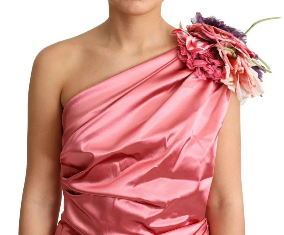 Experience the allure of the Dolce & Gabbana Pink Draped Midi Flower Applique Dress, where exquisite craftsmanship and luxurious materials redefine elegance for any sophisticated affair.