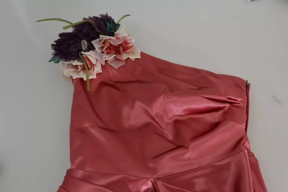 Experience the allure of the Dolce & Gabbana Pink Draped Midi Flower Applique Dress, where exquisite craftsmanship and luxurious materials redefine elegance for any occasion.