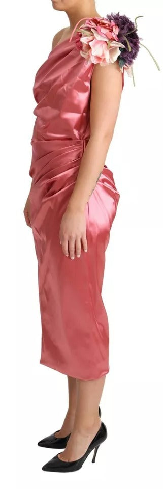 Indulge in the exquisite Dolce & Gabbana Pink Draped Midi Flower Applique Dress, where luxurious silk and meticulous craftsmanship create an unforgettable allure for any elegant affair.