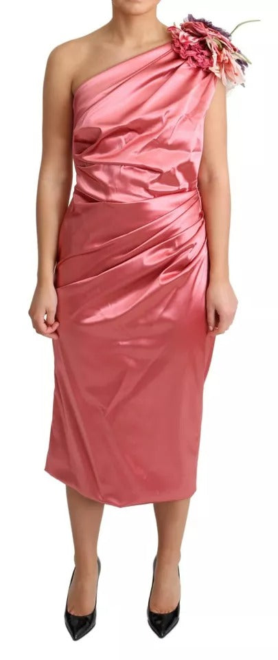 Experience the allure of the Dolce & Gabbana Pink Draped Midi Flower Applique Dress, a masterpiece of Italian craftsmanship that embodies timeless elegance and romantic sophistication.