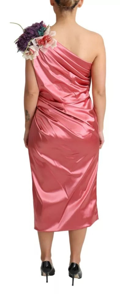 Indulge in the exquisite Dolce & Gabbana Pink Draped Midi Flower Applique Dress, where luxurious silk and intricate craftsmanship create an unforgettable statement of elegance.