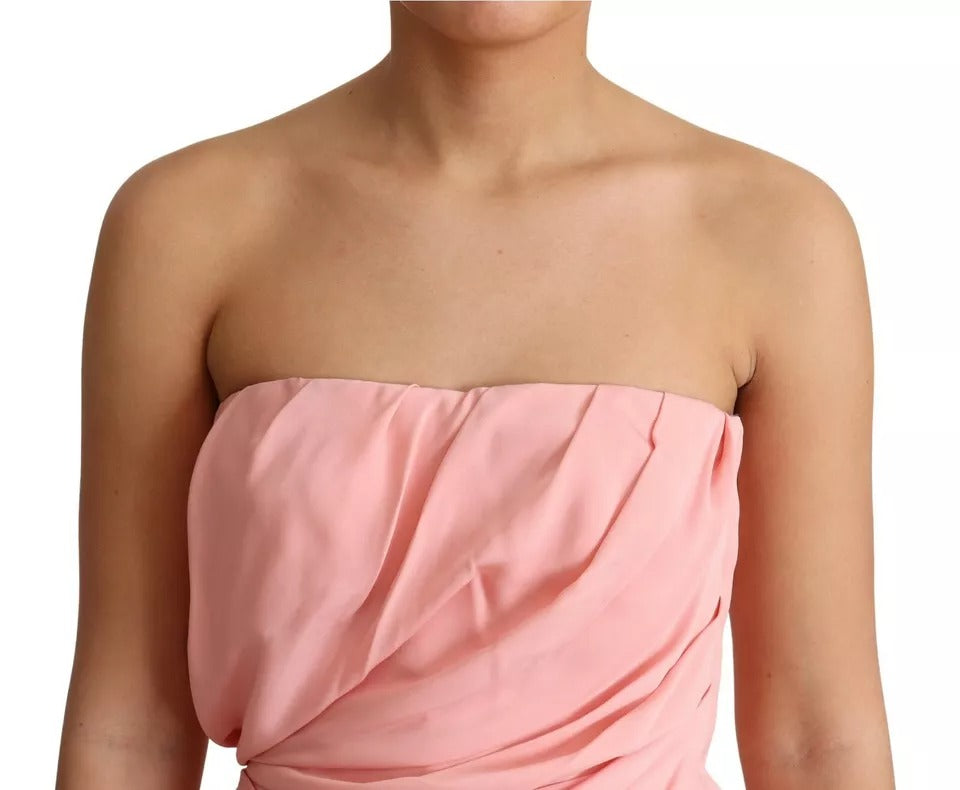 Indulge in the exquisite allure of the Dolce & Gabbana Pink Silk Stretch Strapless Sheath Midi Dress, a timeless masterpiece crafted in Italy, embodying luxury and sophistication.