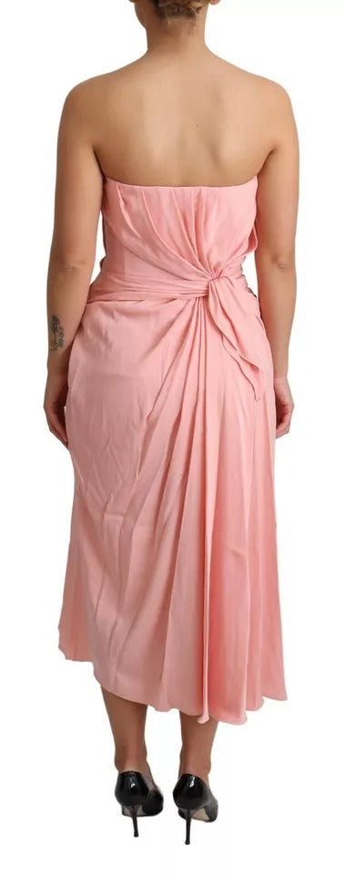 Indulge in the exquisite allure of the Dolce & Gabbana Pink Silk Stretch Strapless Sheath Midi Dress, a masterpiece of Italian craftsmanship that elevates your elegance and sophistication.