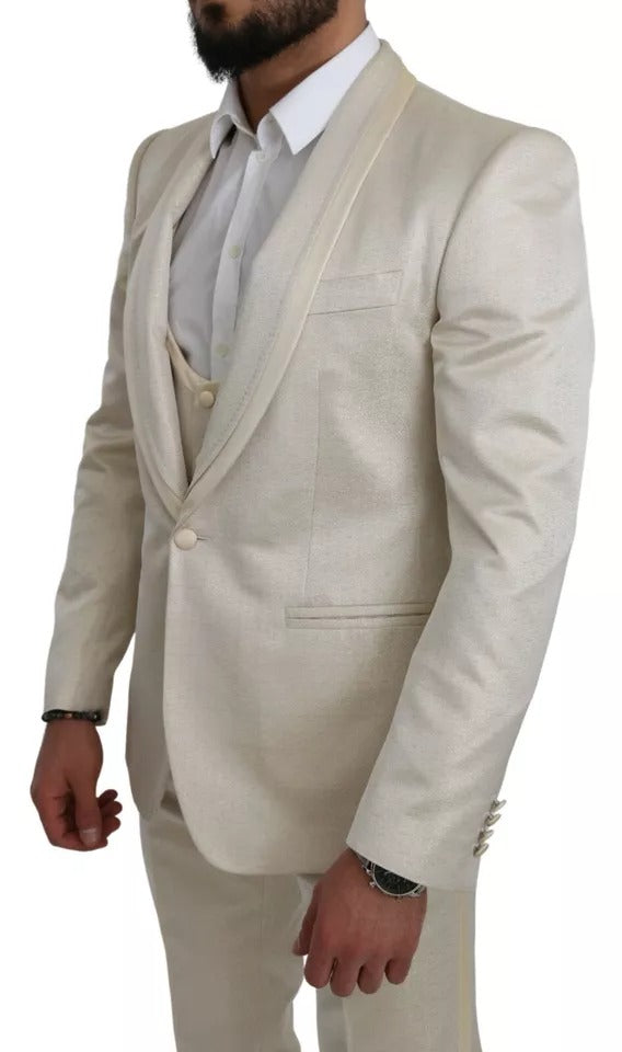 Experience the allure of the Dolce & Gabbana Beige Wool Crème 3 Piece SICILIA Shawl Suit, where exquisite Italian craftsmanship meets timeless elegance for the discerning individual.