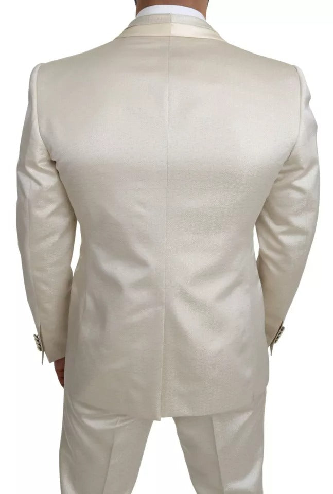 Discover the Dolce & Gabbana Beige Wool Crème 3 Piece SICILIA Shawl Suit, a masterpiece of Italian craftsmanship that exudes timeless elegance and sophisticated allure.