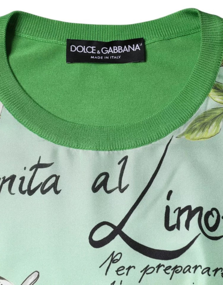 Indulge in the exquisite Dolce & Gabbana Green Silk Granita Al Limone Long Sleeves Sweater, a masterpiece of Italian craftsmanship that elevates your style with luxurious silk and artistic flair.