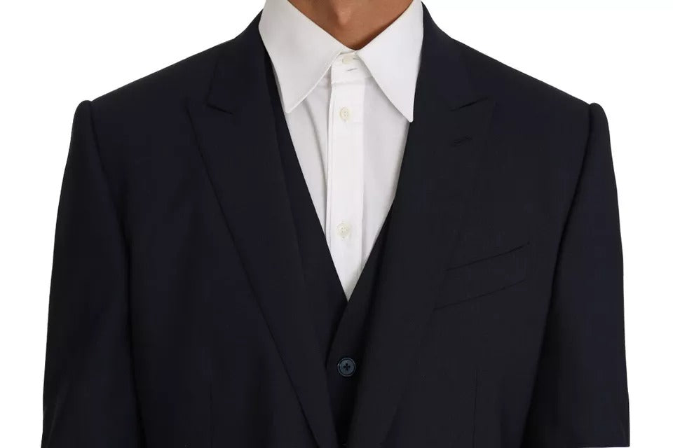 Elevate your wardrobe with the Dolce & Gabbana Blue Wool MARTINI Blazer Vest, a masterpiece of Italian craftsmanship in luxurious wool and elastane, designed for timeless sophistication.