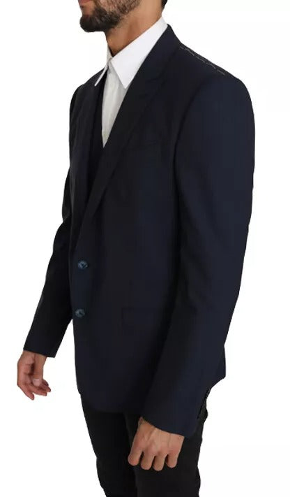 Elevate your wardrobe with the Dolce & Gabbana Blue Wool MARTINI Blazer Vest, a masterful blend of exquisite craftsmanship and luxurious materials, designed for the discerning individual.