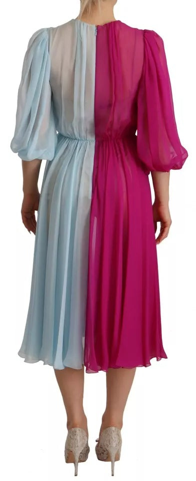 Indulge in the exquisite Dolce & Gabbana Fuchsia Light Blue Silk Two Tone Midi Dress, a masterpiece of Italian craftsmanship that elevates elegance for every sophisticated occasion.