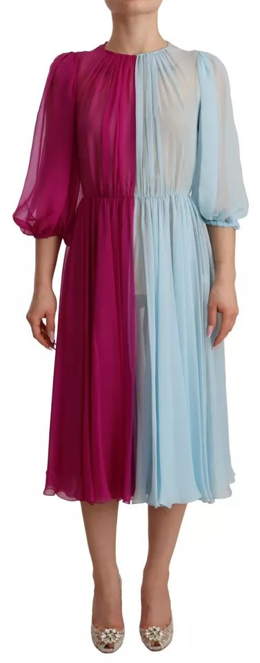 Indulge in the exquisite Dolce & Gabbana Fuchsia Light Blue Silk Two Tone Midi Dress, a masterpiece of Italian craftsmanship that embodies elegance and sophistication for every occasion.