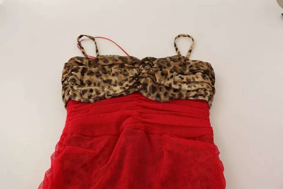 Indulge in the exquisite allure of the Dolce & Gabbana Brown Leopard Red Tulle Sheath Midi Dress, a limited edition masterpiece showcasing Italian craftsmanship and sensual elegance.