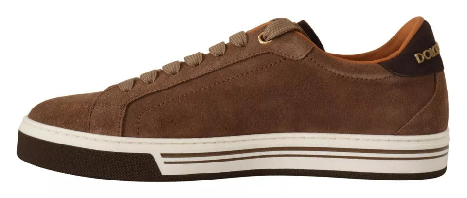 Elevate your style with Dolce & Gabbana's Brown Suede Logo Low Top Sneakers, where exquisite Italian craftsmanship meets timeless luxury for the discerning individual.