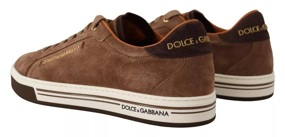 Elevate your style with Dolce & Gabbana's Brown Suede Logo Low Top Sneakers, where exquisite Italian craftsmanship meets timeless luxury for the discerning individual.