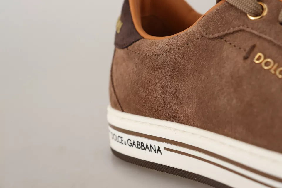 Elevate your style with Dolce & Gabbana's Brown Suede Logo Low Top Sneakers, where exquisite craftsmanship meets timeless luxury for the discerning individual.