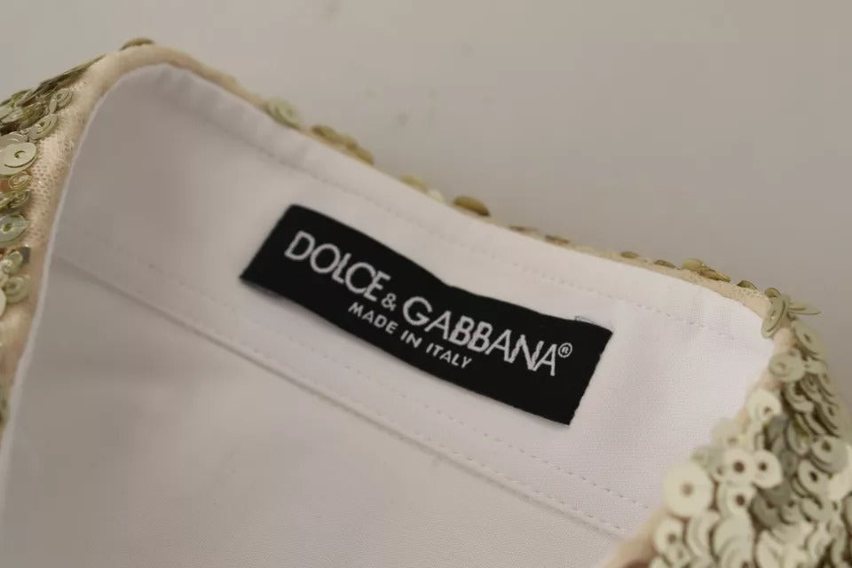 Elevate your elegance with the Dolce & Gabbana White Cotton Collared Long Sleeves Sequin Top Shirt, a masterpiece of Italian craftsmanship that embodies luxurious sophistication.