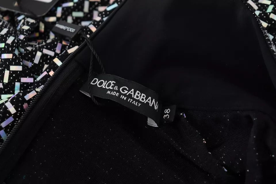 Indulge in the exquisite Dolce & Gabbana Black Embellished Nylon Bodycon Mini Dress, a masterpiece of haute couture that envelops your silhouette in luxurious elegance.