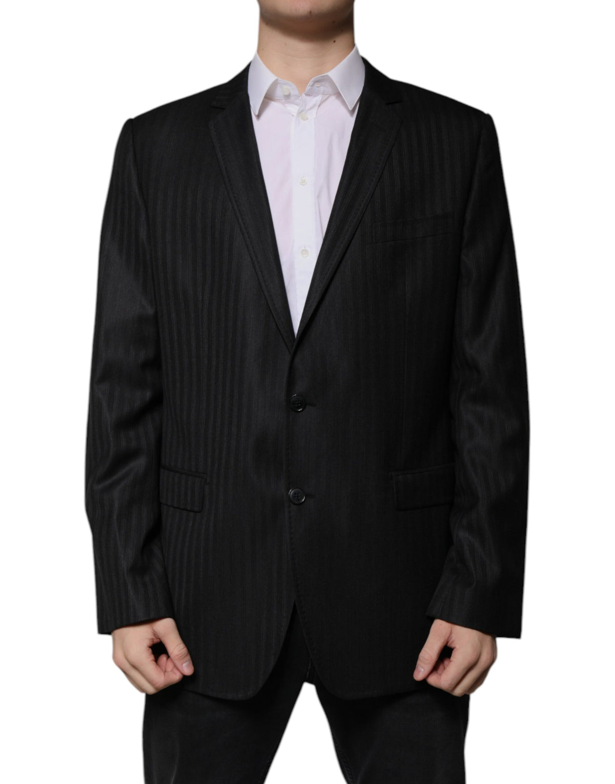 Elevate your wardrobe with the Dolce & Gabbana Black Stripe Wool Blazer, a masterpiece of Italian craftsmanship blending luxurious wool and silk for timeless sophistication.
