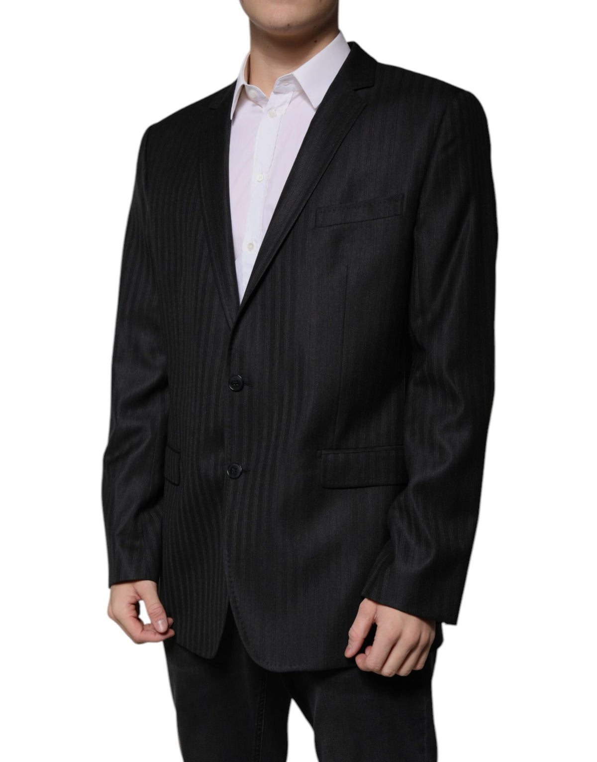 Elevate your wardrobe with the Dolce & Gabbana Black Stripe Wool Blazer, a luxurious blend of 67% wool and 33% silk, embodying refined craftsmanship and timeless elegance.