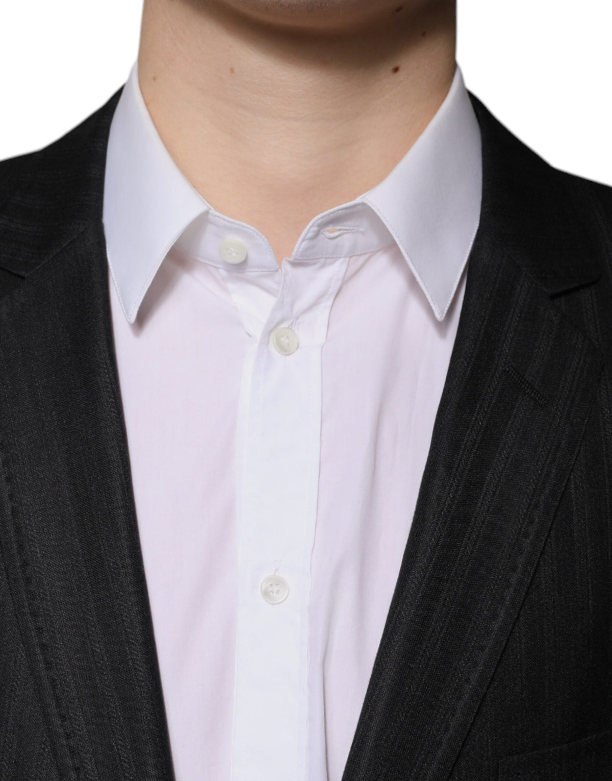 Elevate your wardrobe with the Dolce & Gabbana Black Stripe Wool Blazer, a luxurious blend of 67% wool and 33% silk, embodying exquisite craftsmanship and timeless elegance.
