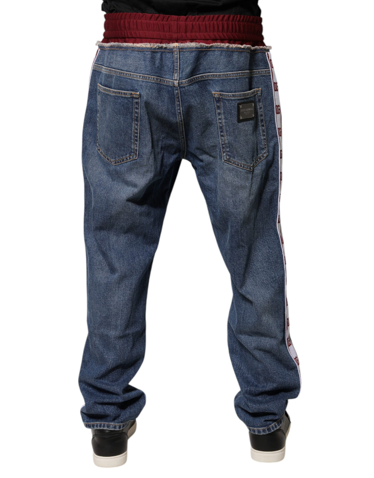 Indulge in the exquisite allure of Dolce & Gabbana's Blue Cotton Stretch Straight Denim Jeans, where Italian craftsmanship meets effortless elegance for a refined wardrobe essential.