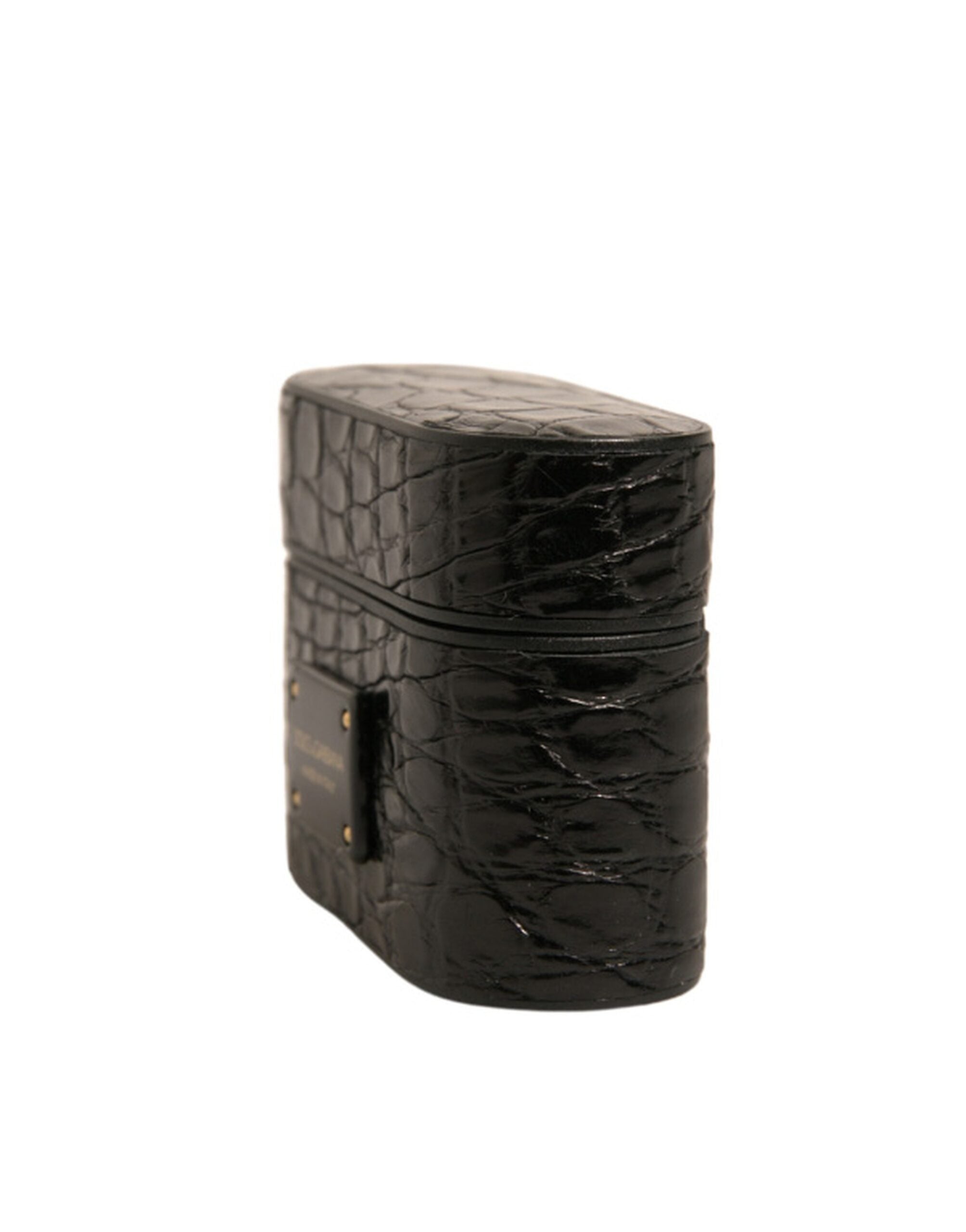Indulge in the exquisite Dolce & Gabbana Black Leather Airpods Case, crafted from luxurious Caiman leather, merging timeless elegance with modern sophistication for the discerning individual.