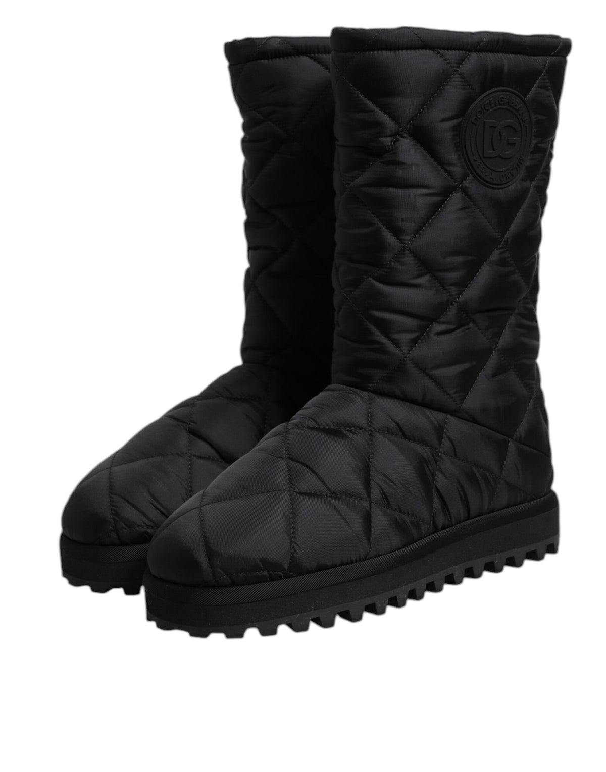 Elevate your winter wardrobe with Dolce & Gabbana's Black Polyester Padded Mid Calf Boots, where exquisite craftsmanship meets luxurious comfort for the discerning individual.