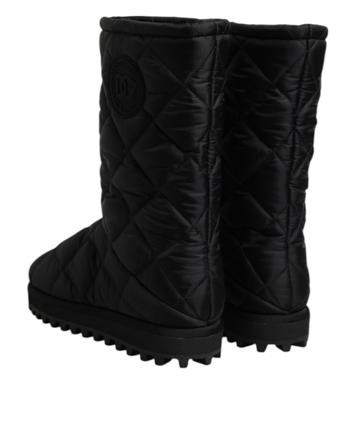 Step into refined elegance with Dolce & Gabbana's Black Polyester Padded Mid Calf Boots, crafted in Italy for those who embody luxury and sophistication.