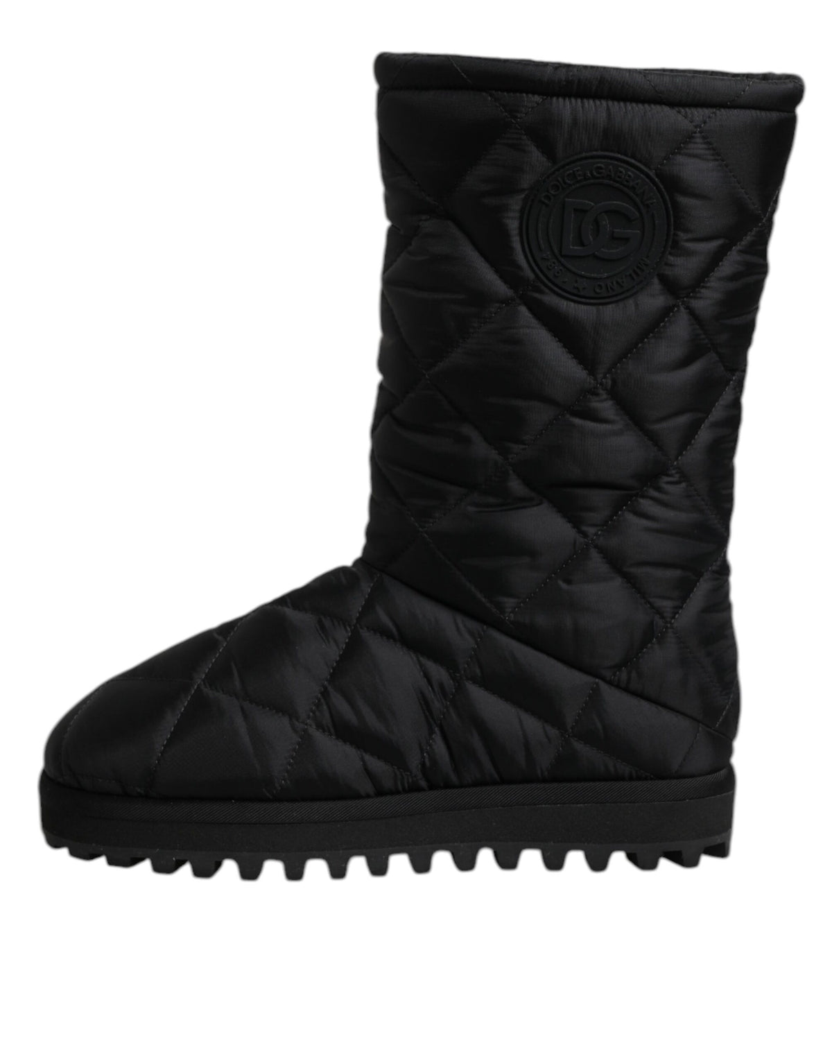 Discover the exquisite Dolce & Gabbana Black Polyester Padded Mid Calf Boots, a luxurious blend of sophistication and comfort, crafted for the discerning individual.