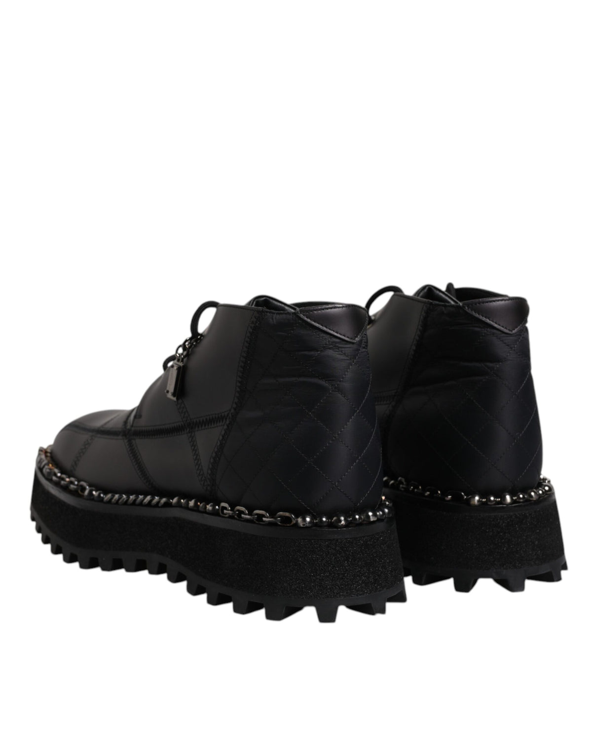 Step into unparalleled elegance with Dolce & Gabbana's Black Leather Lace Up Ankle Boots, where exquisite Italian craftsmanship meets timeless sophistication for the discerning individual.