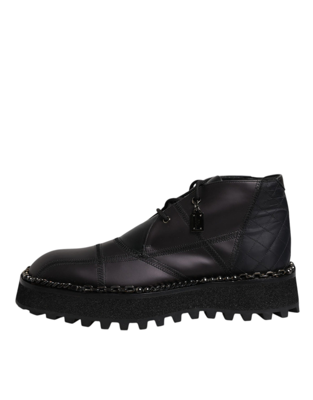 Step into the realm of luxury with Dolce & Gabbana's Black Leather Lace Up Ankle Boots, where exquisite Italian craftsmanship meets timeless sophistication for the discerning individual.