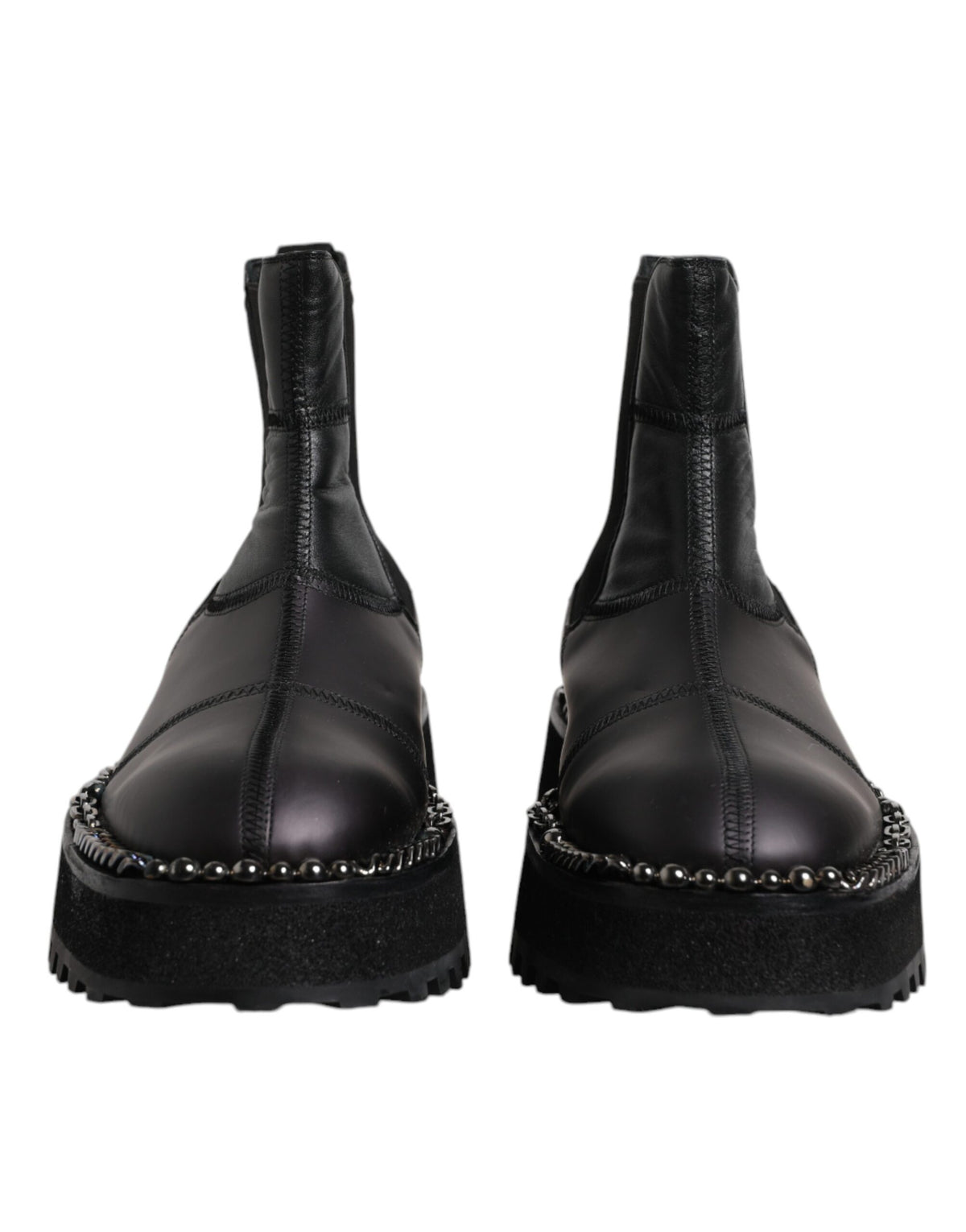 Indulge in the exquisite Dolce & Gabbana Black Chelsea Boots, crafted from luxurious lamb leather, embodying timeless elegance and unparalleled Italian craftsmanship for the discerning individual.