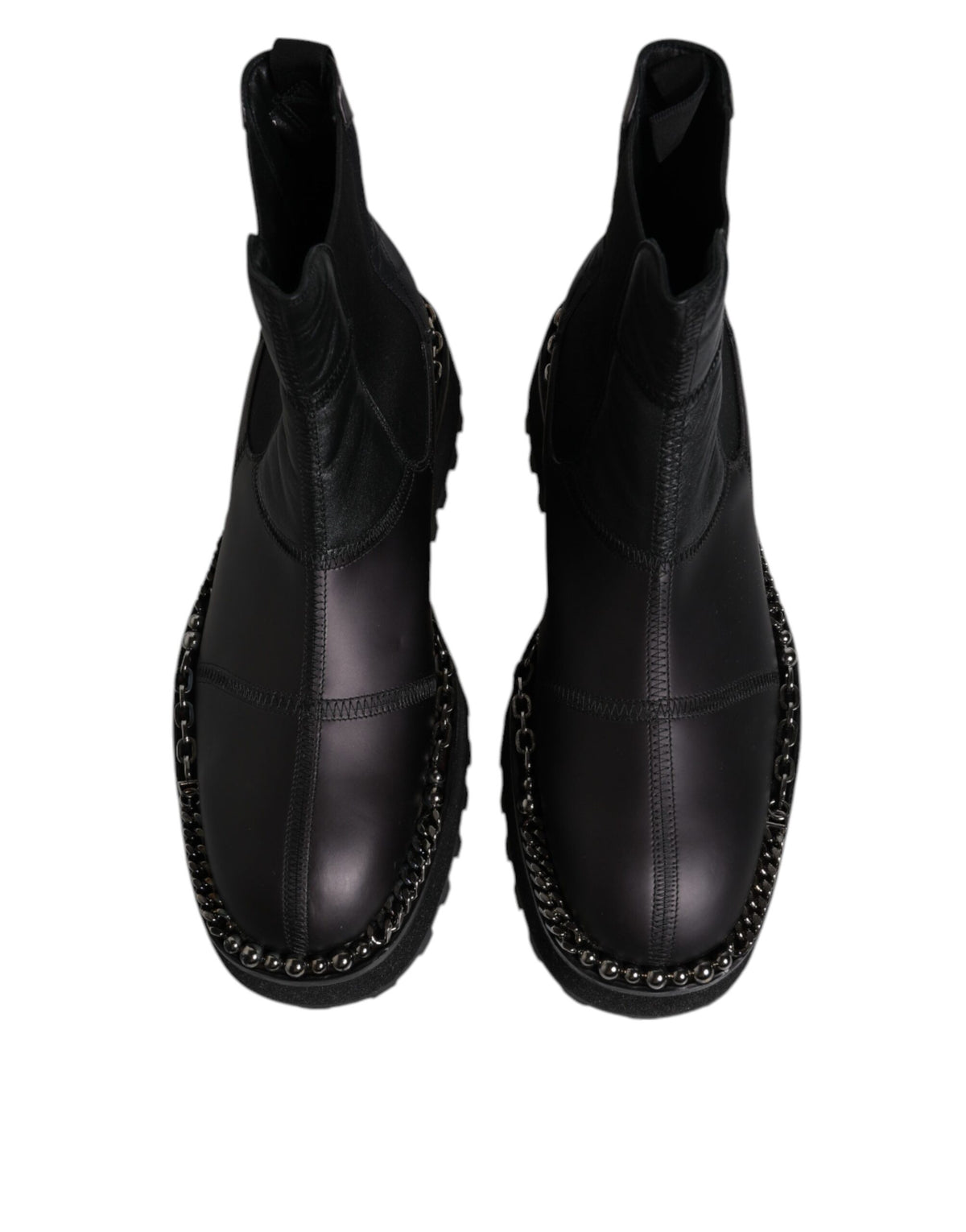 Step into the realm of luxury with Dolce & Gabbana Black Chelsea Boots, where exquisite lamb leather meets Italian craftsmanship for timeless elegance and effortless sophistication.