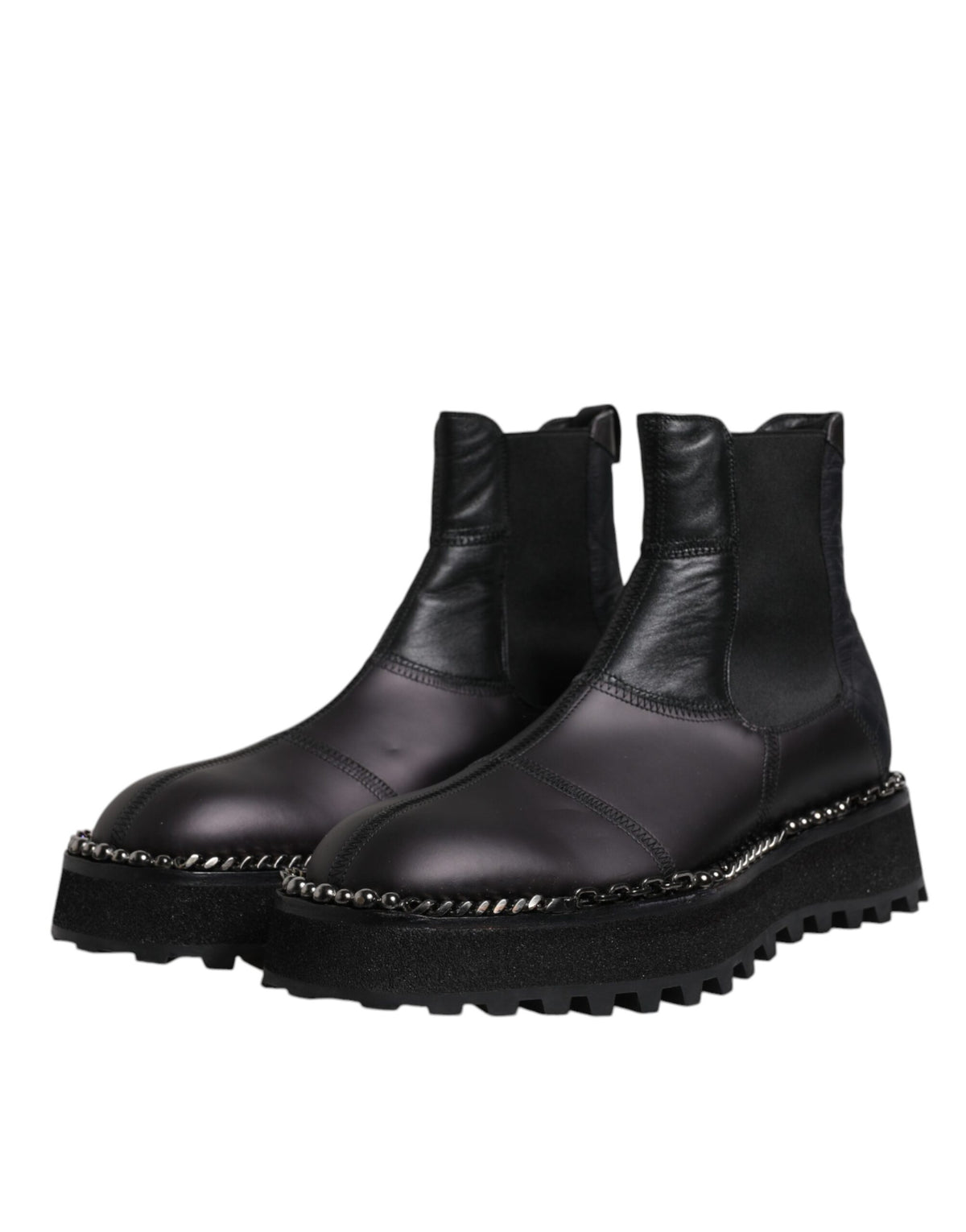 Step into luxury with Dolce & Gabbana Black Chelsea Boots, crafted from sumptuous lamb leather, embodying timeless elegance and artisanal Italian craftsmanship for the discerning individual.