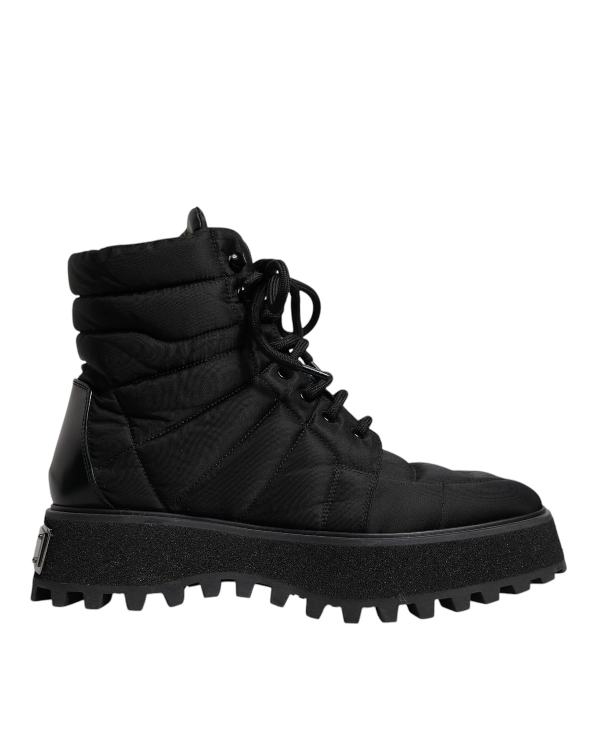 Elevate your style with Dolce & Gabbana's Black Padded Mid Calf Lace Up Boots, a masterful blend of luxurious materials and Italian craftsmanship, perfect for the discerning individual.
