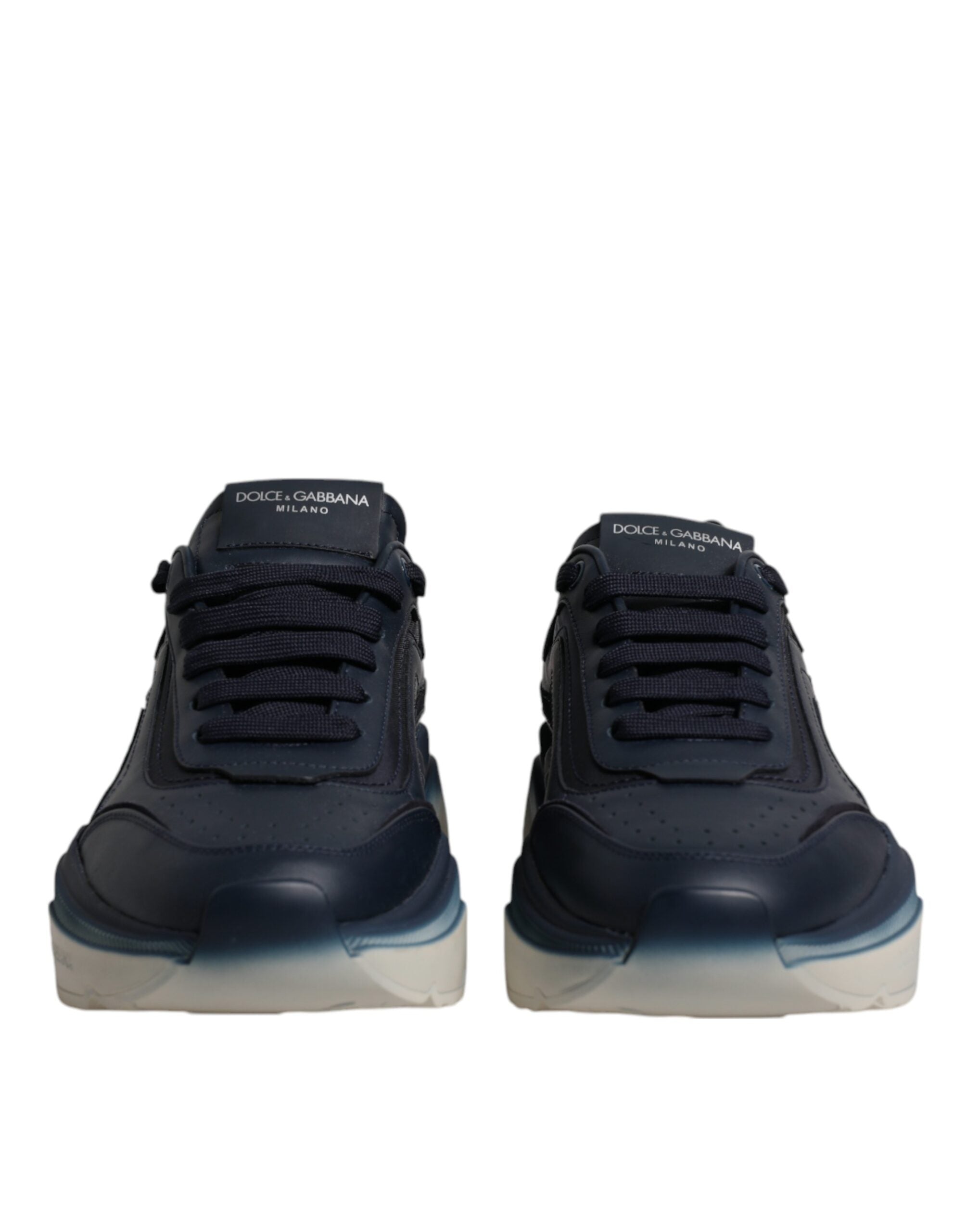 Step into luxury with Dolce & Gabbana's Navy Blue Daymaster Low Top Sneakers, crafted from premium calf leather and nylon, embodying sophistication and timeless elegance.