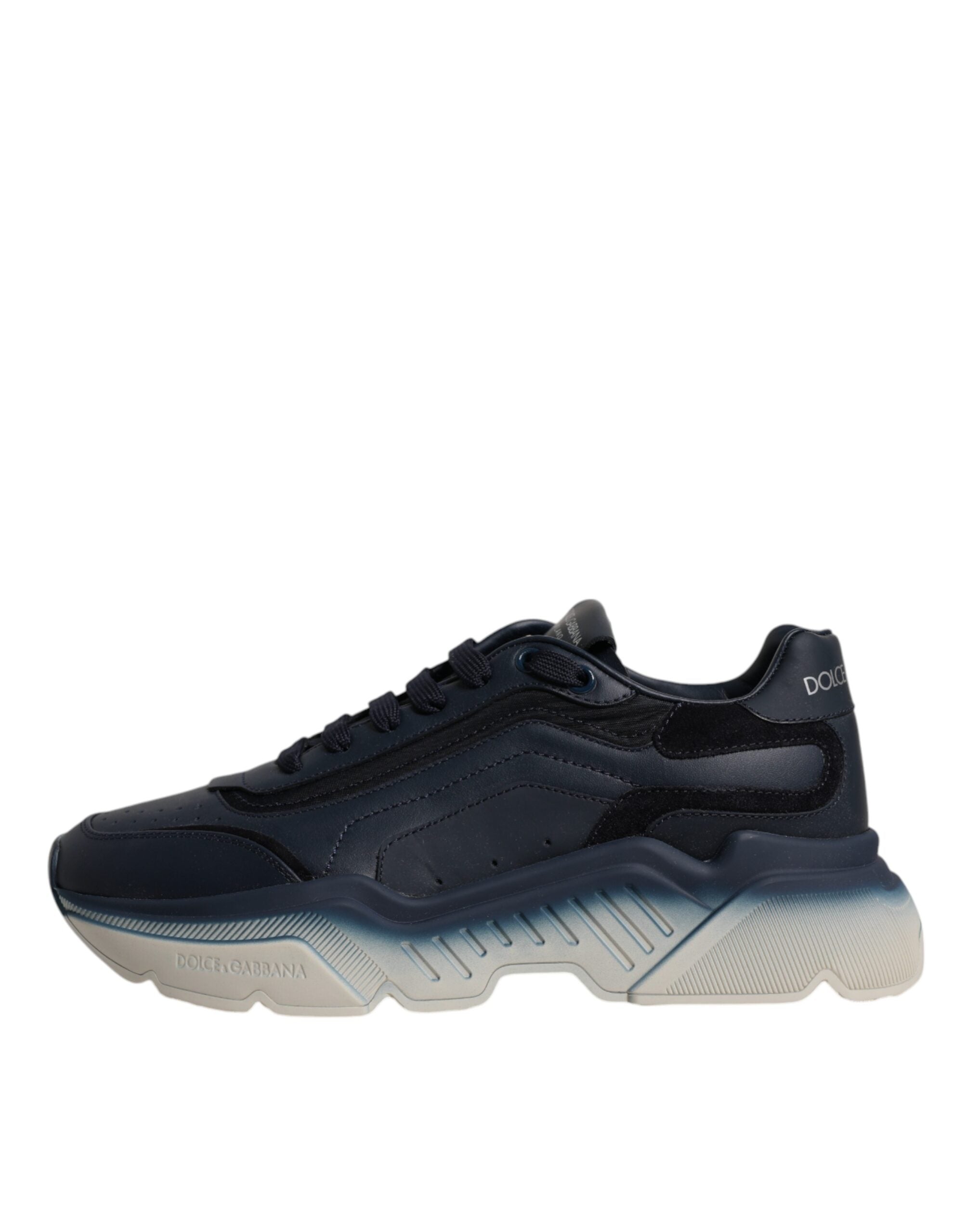 Discover the Dolce & Gabbana Navy Blue Daymaster Low Top Sneakers, a blend of calf leather and nylon, embodying Italian craftsmanship and timeless elegance for the discerning individual.