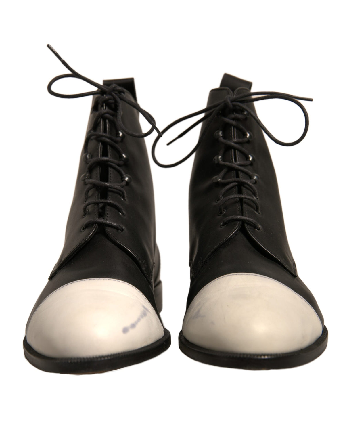 Elevate your style with Sergio Rossi's Black White Leather Lace Up Ankle Boots, a masterpiece of Italian craftsmanship that embodies timeless sophistication and allure.