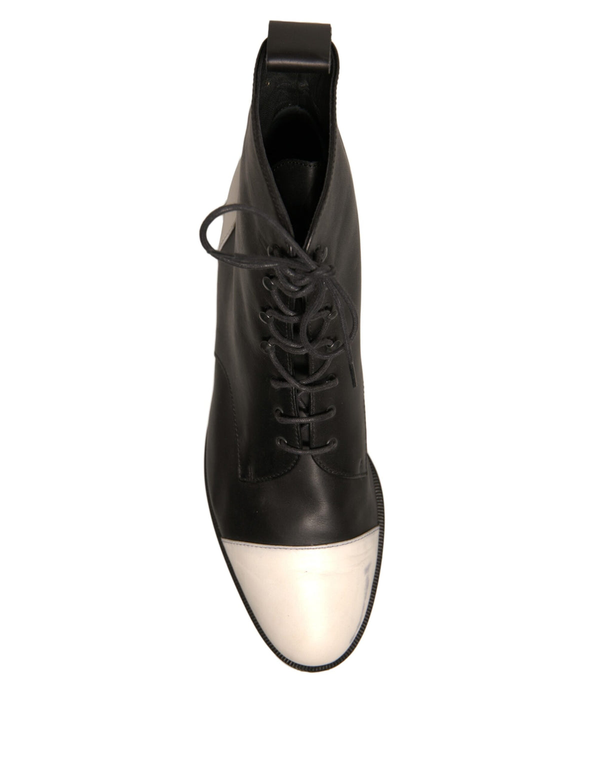 Elevate your style with Sergio Rossi's Black White Leather Lace Up Ankle Boots, a testament to Italian craftsmanship that embodies timeless elegance and sophistication.