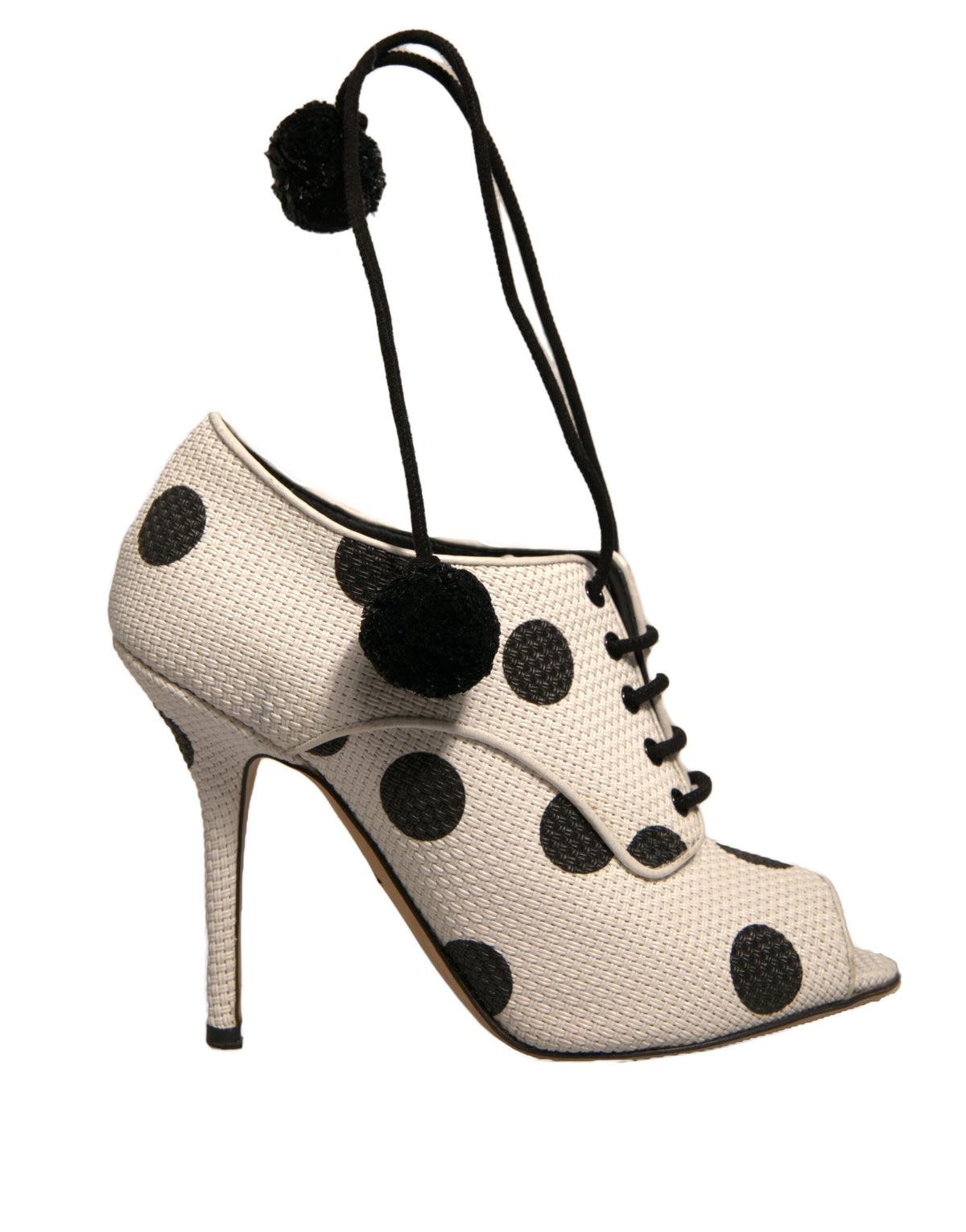 Step into elegance with Dolce & Gabbana's White Black Polka Dot Peep Toe Ankle Boots, where luxurious leather meets playful design for timeless allure.