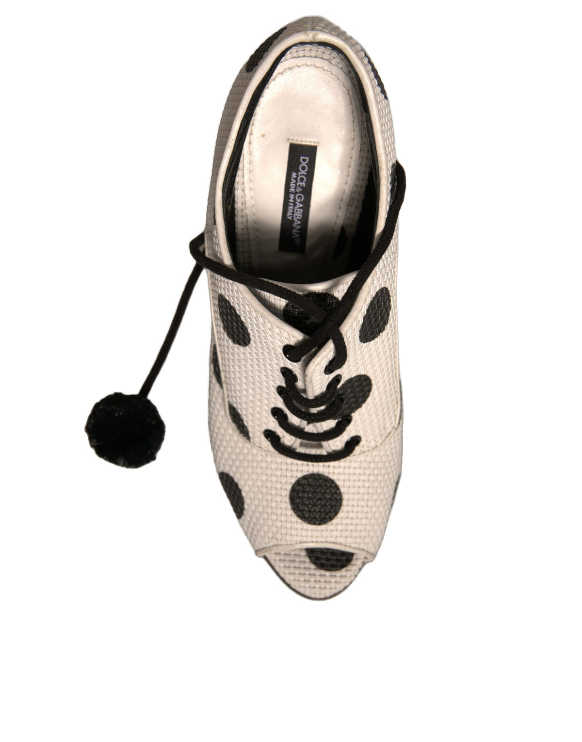 Step into refined elegance with Dolce & Gabbana's White Black Polka Dot Peep Toe Ankle Boots, where luxurious leather meets playful design for timeless allure.