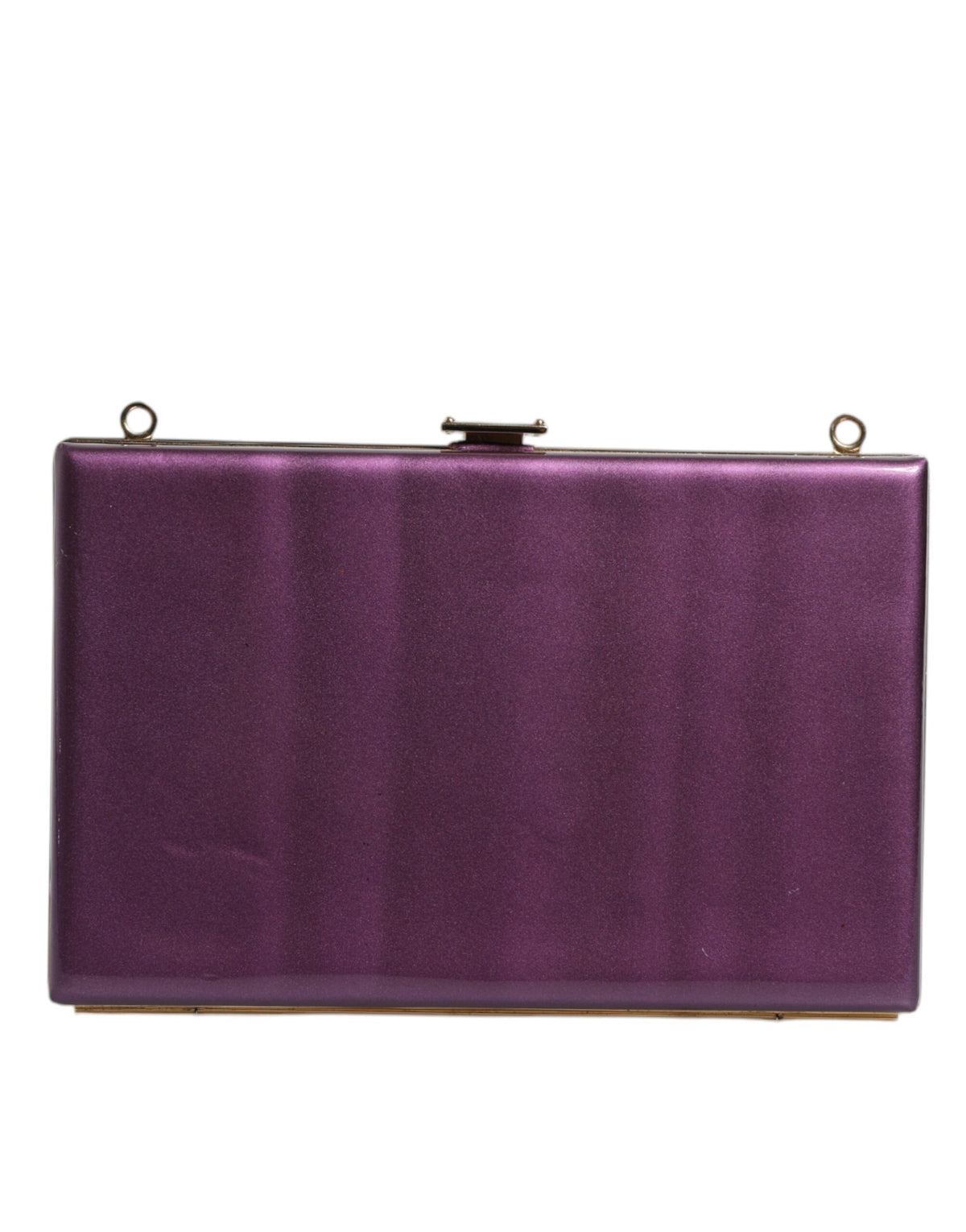 Indulge in the exquisite Dolce & Gabbana Purple Leather Clutch, a handcrafted masterpiece that embodies luxury and sophistication for any elegant occasion.